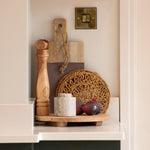 Woven from jute featuring an open weave floral pattern - the circular mat in natural tones will complement every tabletop