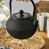 Woven from jute featuring an open weave floral pattern - the circular mat in natural tones will complement every tabletop