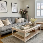 Elegant living room decor with an acacia coffee table with rattan and a glass top.