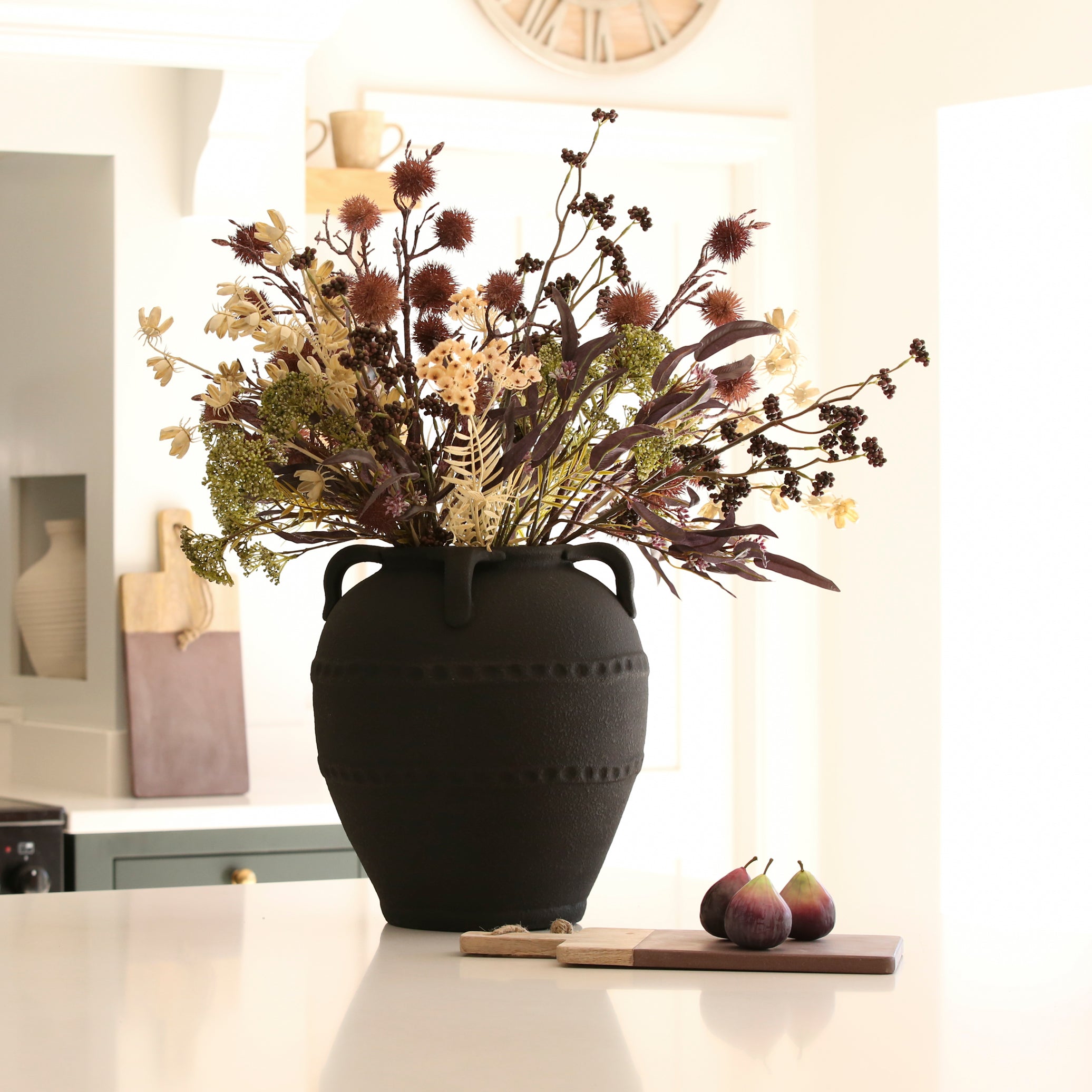 striking terracotta vase with handle detail