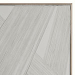 Close-up of a textured wall panel with a geometric pattern