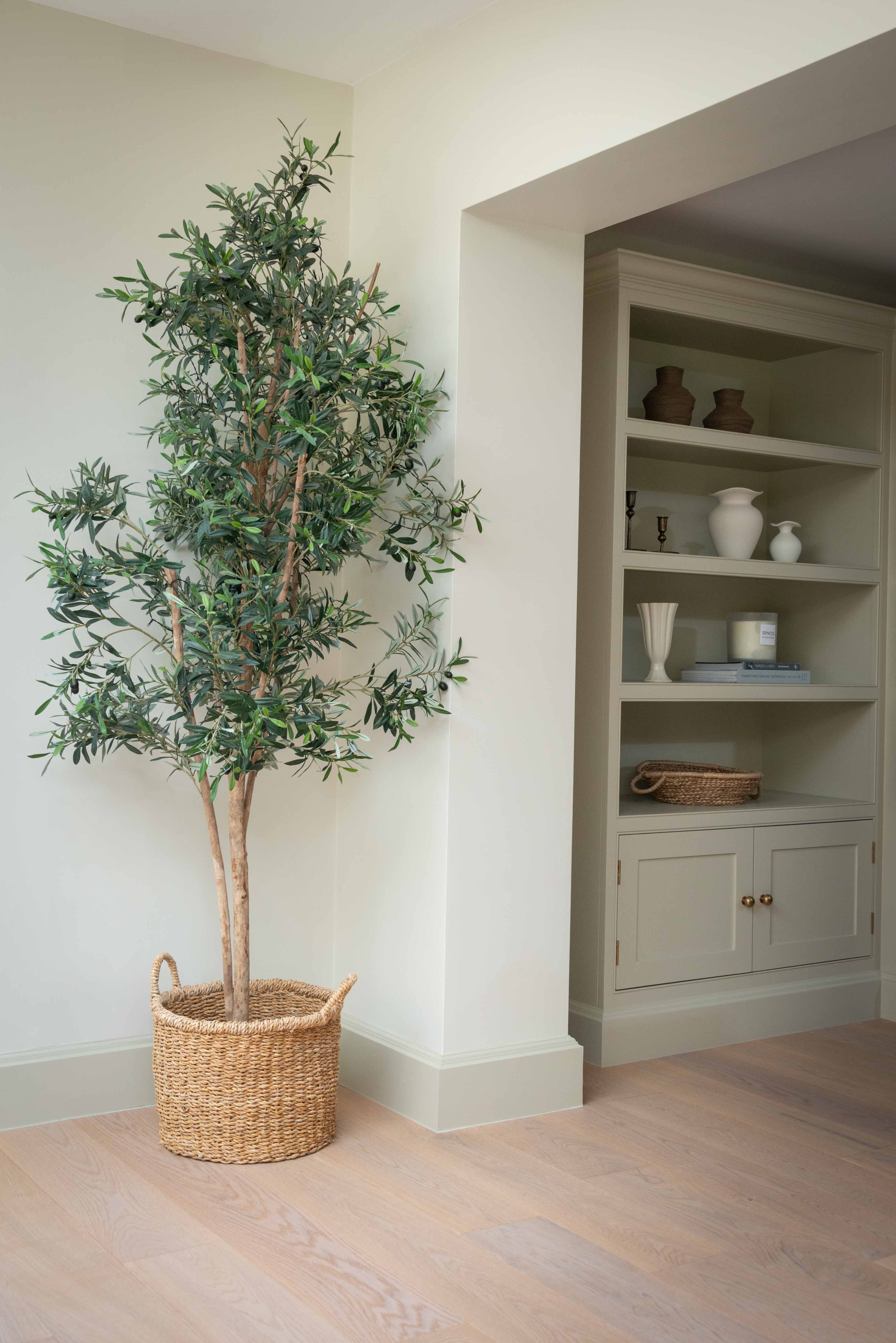 Bring Timeless Mediterranean Charm to Your Space with Our Faux Olive Tree
Add a touch of natural elegance to any room with our artificial olive tree, designed to replicate the delicate beauty of a real olive plant without the upkeep. Standing at an impressive 180cm (5.9 feet), this lifelike faux olive tree features slender branches, realistic green leaves, and carefully crafted faux olives for an authentic look.
Perfect for home interiors, offices, or commercial spaces, this artificial indoor olive t
