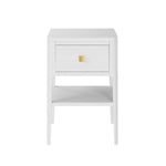 A white bedside table with a drawer and a gold-colored handle, featuring curved legs and a shelf below.