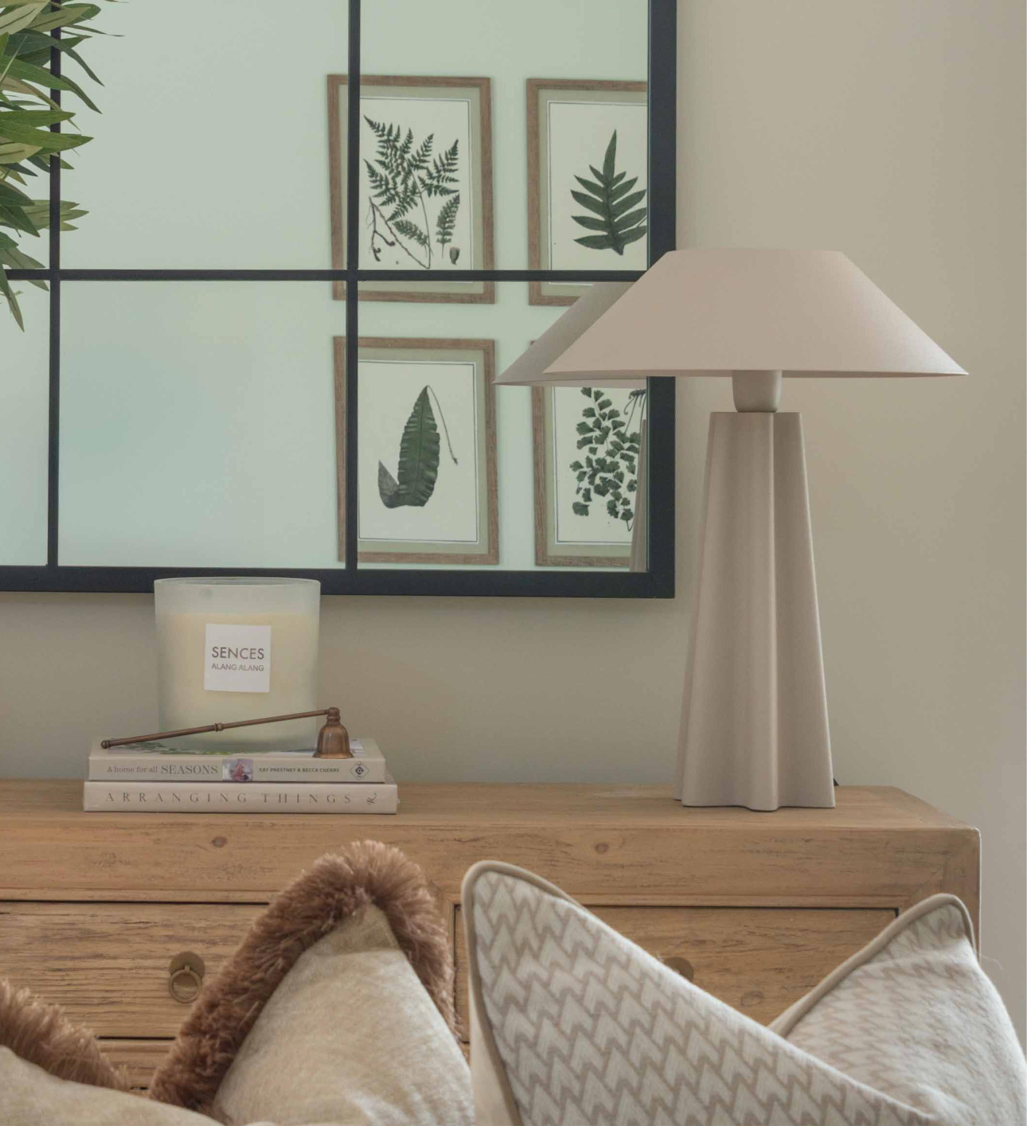 Modern beige metal table lamp in a living room setting