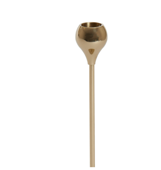 Gold metal candlestick holder with a sleek round base and modern design close up