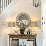 Three-drawer console table made from reclaimed, weathered pine