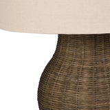 Coastal style rattan lamp with natural linen shade close up