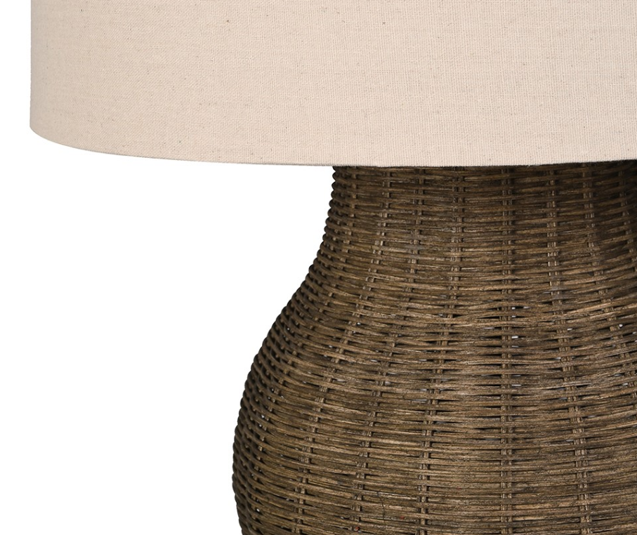 Coastal style rattan lamp with natural linen shade close up