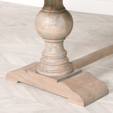 Bordeaux Mango Wood Dining Table with rustic natural finish and hand-carved pedestal base