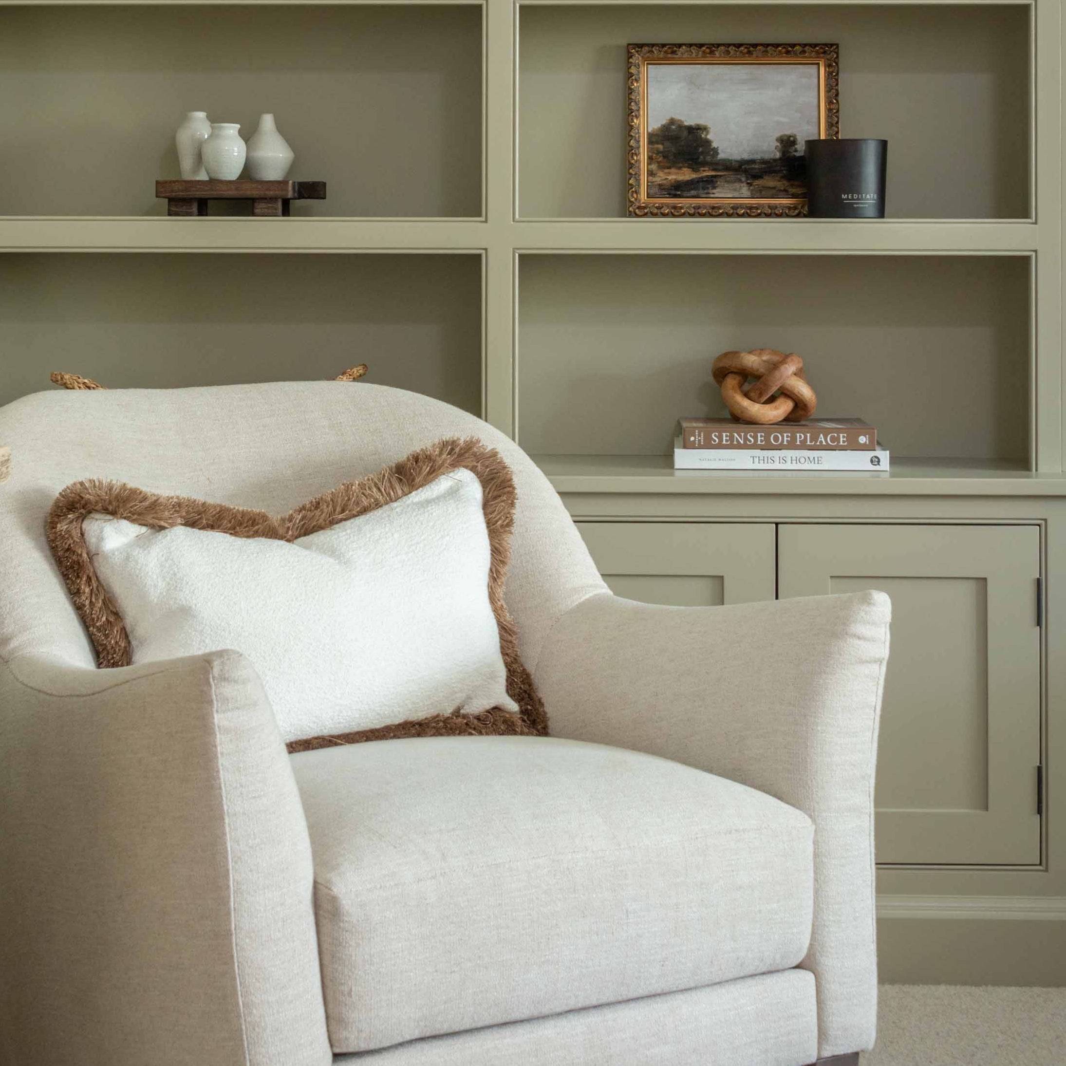 Add texture and warmth to your space with our luxurious bouclé oblong cushion, measuring 30cm x 50cm. This plush decorative pillow features a soft, nubby bouclé fabric in a creamy neutral tone, perfectly complemented by a rich multitonal fringe that adds a refined, earthy touch. Ideal for accenting armchairs, sofas, or bedding, this cushion delivers both comfort and timeless style. Whether your décor leans modern, rustic, or classic, this versatile piece enhances any interior with cozy sophistication.