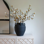 striking terracotta vase with handle detail