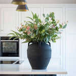 striking terracotta vase with handle detail