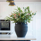 striking terracotta vase with handle detail