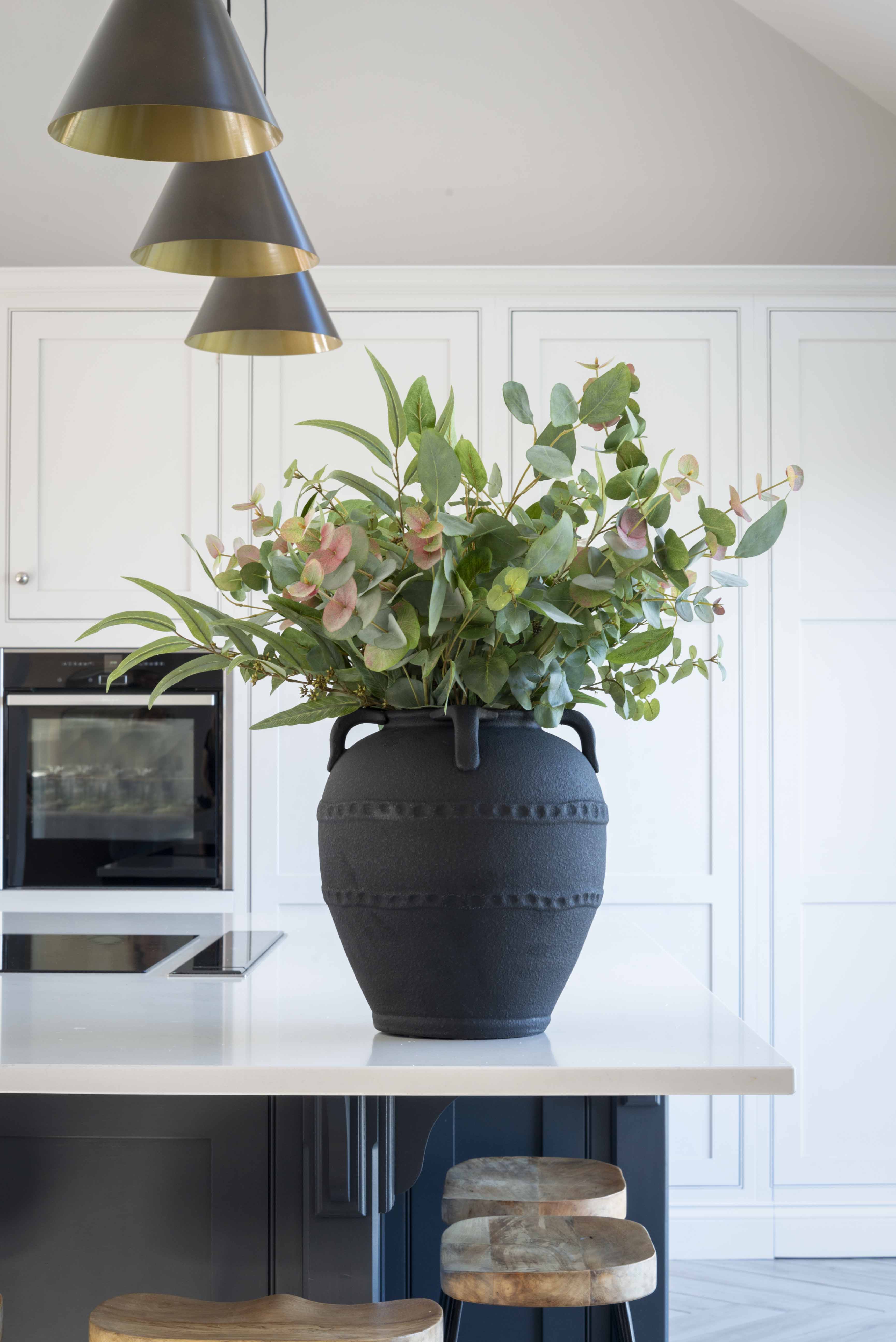 striking terracotta vase with handle detail