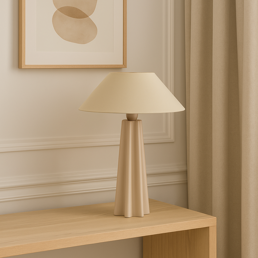 Beige lamp on a wooden side table with abstract art on the wall