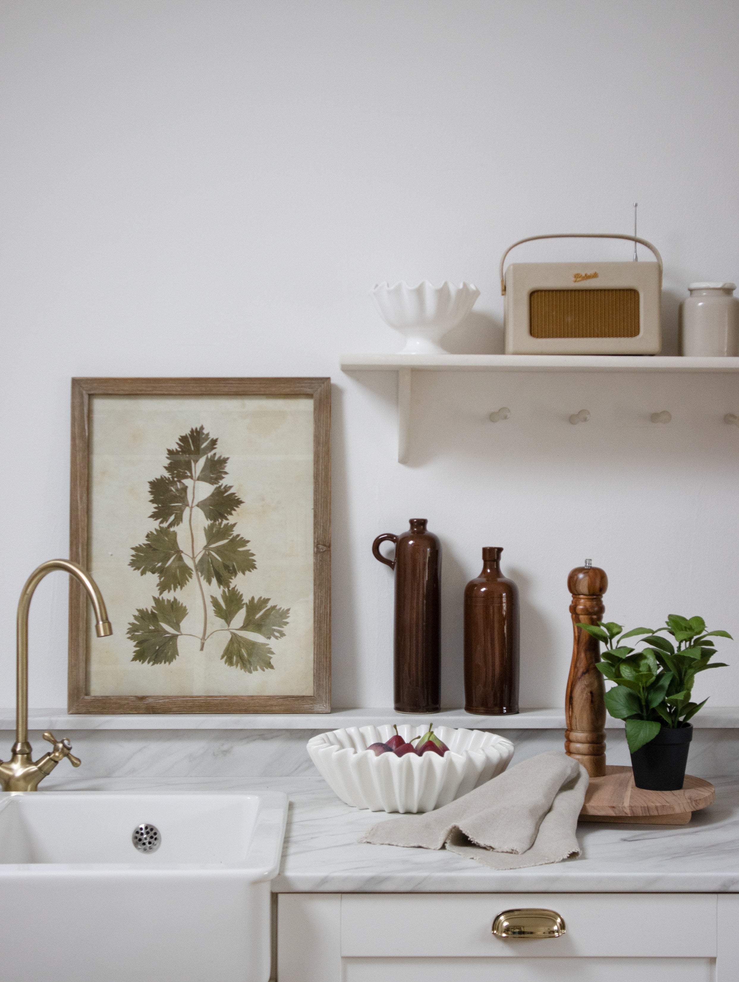 A set of two beautiful leaf prints in a fir wood frame.