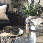 Chinoiserie short pot styled with flowers on a coffee table