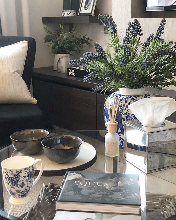 Chinoiserie short pot styled with flowers on a coffee table