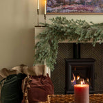 Charles Ted Cotton Velvet Christmas Sack in mocha with linen top and jute tie placed under a Christmas tree by a fireplace