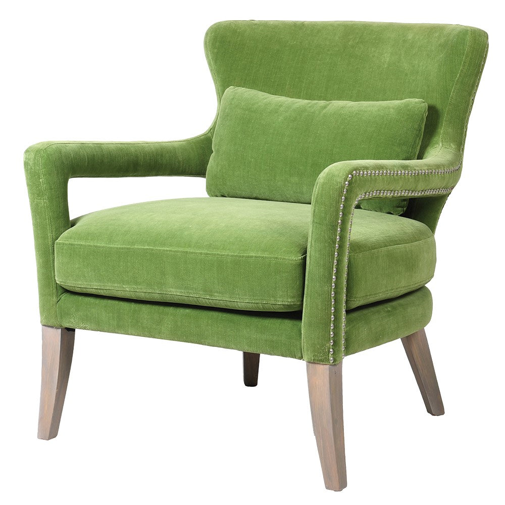 Upholstered in lush green velvet, this stylish chair features a supportive high back, plush seat cushion, and a coordinating lumbar pillow for added comfort. The sleek, tapered wooden legs