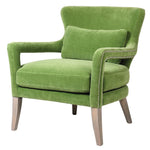 Upholstered in lush green velvet, this stylish chair features a supportive high back, plush seat cushion, and a coordinating lumbar pillow for added comfort. The sleek, tapered wooden legs
