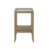 A stunning end table crafted in aged oak featuring a glass top, tapered legs and a shelf underneath.