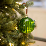 Charles Ted Green Glass Ribbed Baubles hanging on a Christmas tree