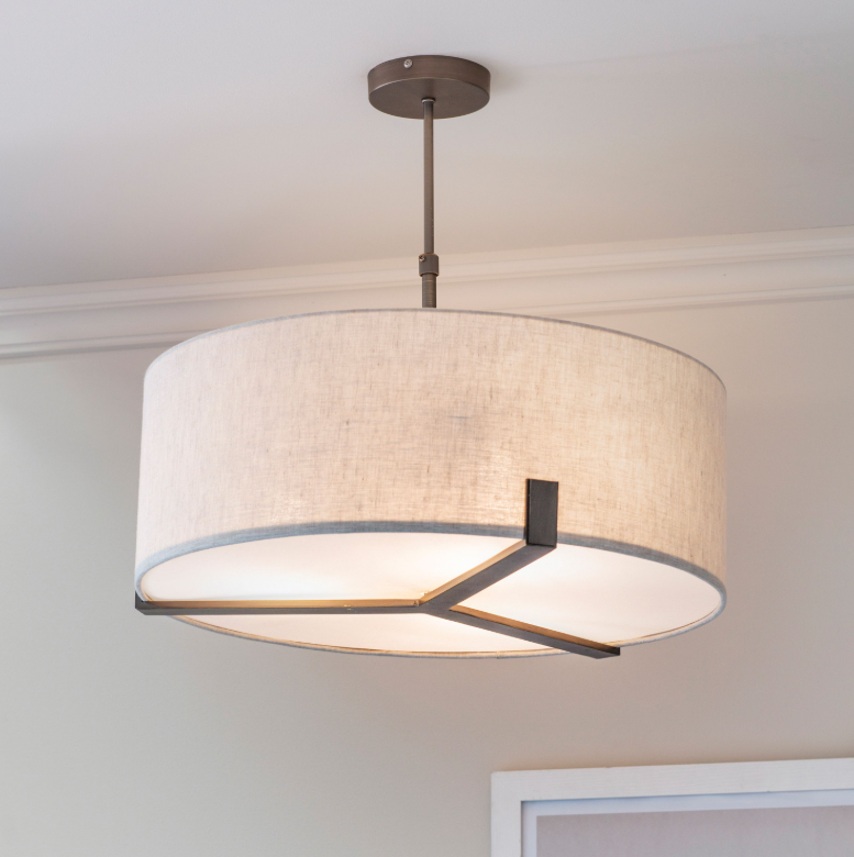 Modern ceiling pendant light with linen shade and bronze metalwork