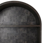 Dark stone wall with a wooden shelf