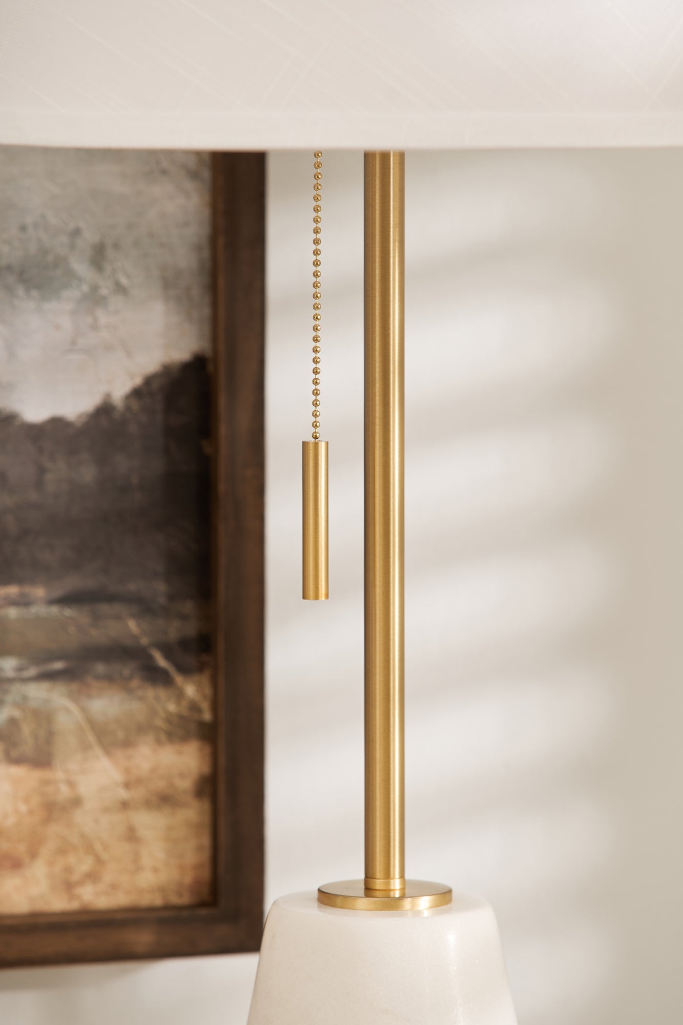 Close-up of gold pull cord on Charles Ted Rayan Marble Lamp