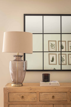 Elegant Charles Ted Tallado glass lamp on wooden console table