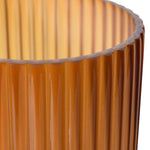 Close-up of ribbed amber ombre glass vase showing textured details