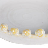 Close-up of handcrafted golden beaded rim on the Elara Decorative Ceramic Bowl