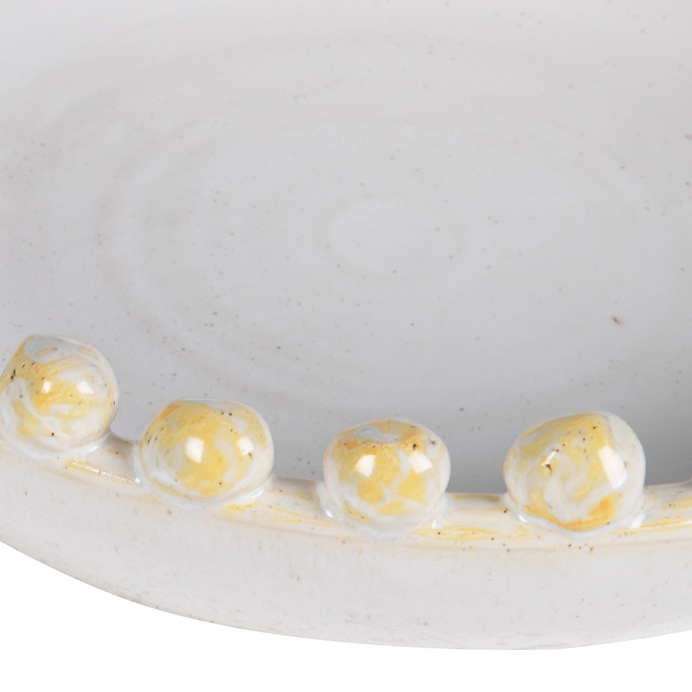 Close-up of handcrafted golden beaded rim on the Elara Decorative Ceramic Bowl