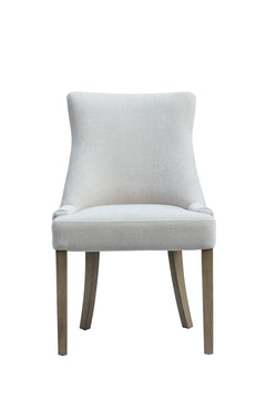 Upgrade your dining space with this beautifully crafted dining chair, featuring a plush clay chenille upholstered seat and solid oak legs. Designed for both comfort and sophistication, this modern dining chair offers a gently curved backrest and cushioned seating, making it perfect for long dinners and stylish gatherings.
The neutral clay tone adds a contemporary touch that complements a wide range of dining room decors, while the natural oak wood legs bring warmth and durability. Ideal for modern farmhous