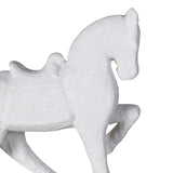 Close-up of textured white horse statue showing details of saddle and pose