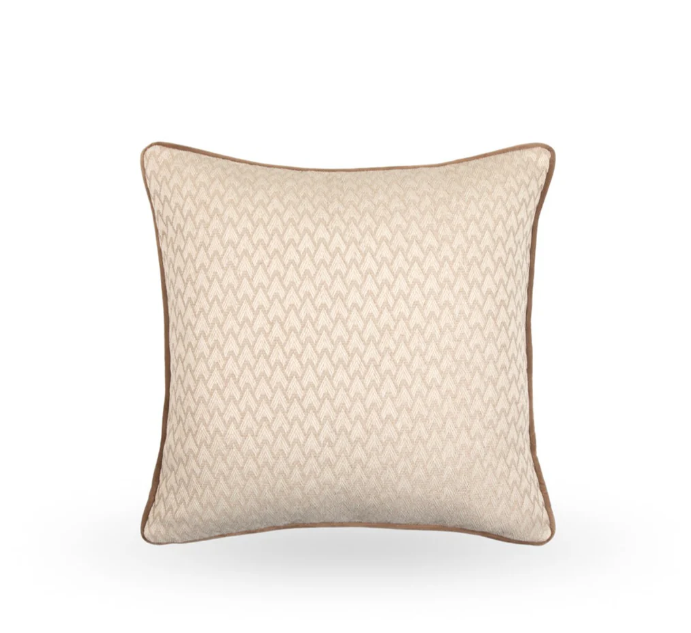 Bring timeless elegance and refined comfort to your home with this beautifully crafted cushion, featuring a delicate woven chevron-inspired pattern. The soft neutral tones are accented with a warm caramel piping and a matching caramel back, making it the perfect addition to both modern and traditional interiors.
Whether styled on a sofa, armchair, or bed, this versatile cushion adds texture and visual interest without overpowering your space. Designed with both aesthetics and functionality in mind, it's an