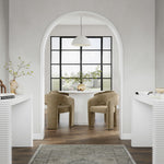 The Elvie is a modern and stylish piece which comes in a comfortable and soft, mole shade of velvet. The sleek design makes a fantastic addition to any dining setting, from modern and minimalist to chic and eclectic. Whether used as a set around a dining table or as a standalone accent chair, the Elvie effortlessley elevates your space with its contemporary appeal.