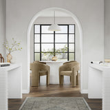 The Elvie is a modern and stylish piece which comes in a comfortable and soft, mole shade of velvet. The sleek design makes a fantastic addition to any dining setting, from modern and minimalist to chic and eclectic. Whether used as a set around a dining table or as a standalone accent chair, the Elvie effortlessley elevates your space with its contemporary appeal.