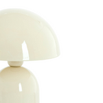 Cream-colored table lamp on a white background