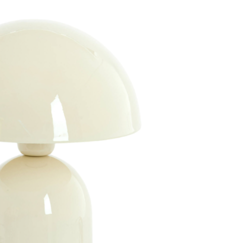 Cream-colored table lamp on a white background