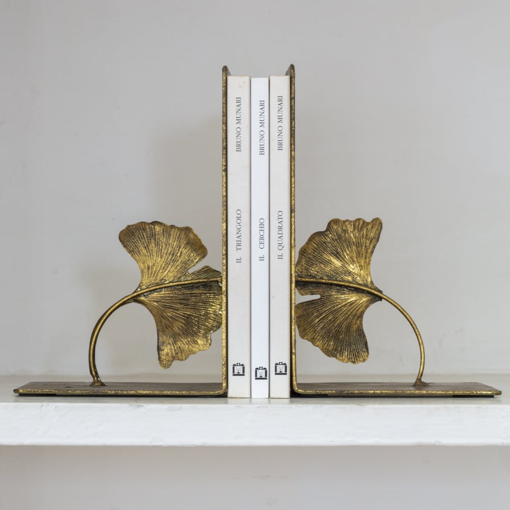 Golden ginkgo leaf bookends holding books