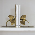 Golden ginkgo leaf bookends holding books
