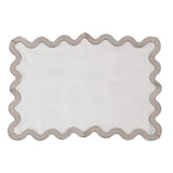 Set of four linen placemats with scalloped wave border