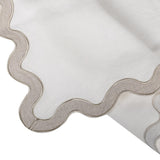 Elegant linen placemat with decorative wavy trim