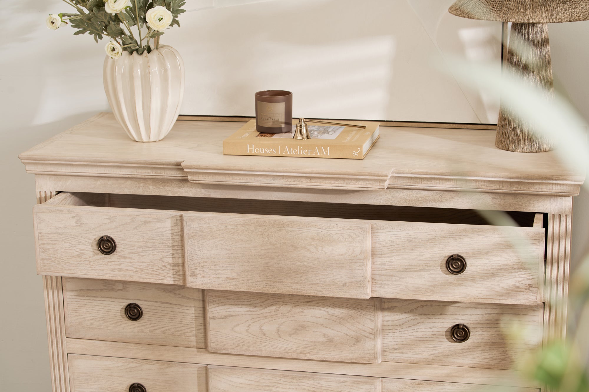 close-up of Longbourn Chest top surface styled with décor