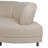 Detailed view of the boucle texture and rounded arm of the Lumin Curved Sofa