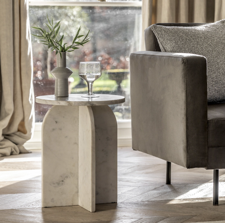 Modern Marble-Effect Side Table – Sculptural Accent for Contemporary Living Spaces
Elevate your home décor with this stunning modern side table, featuring a unique marble-effect finish and sculptural silhouette. Designed to be both functional and artistic, this round-top accent table is crafted with a bold, cross-shaped pedestal base that offers stability and visual intrigue. Its rich earth-toned pattern mimics natural stone, making it the perfect statement piece for living rooms, bedrooms, or stylish entr