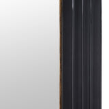 Full-length arch mirror with black frame and gold detailing close up