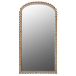Natural wood arched floor length mirror with circular carved frame inspired by coastal design